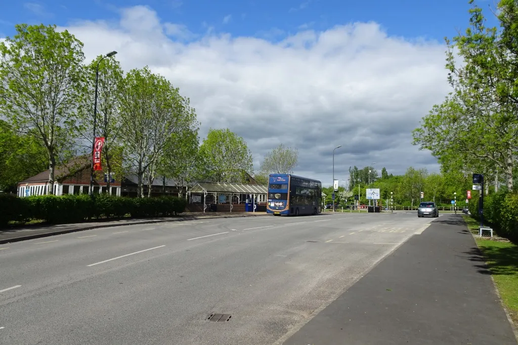 A park and ride bus at the Rawcliffe Bar terminal building on a sunny day