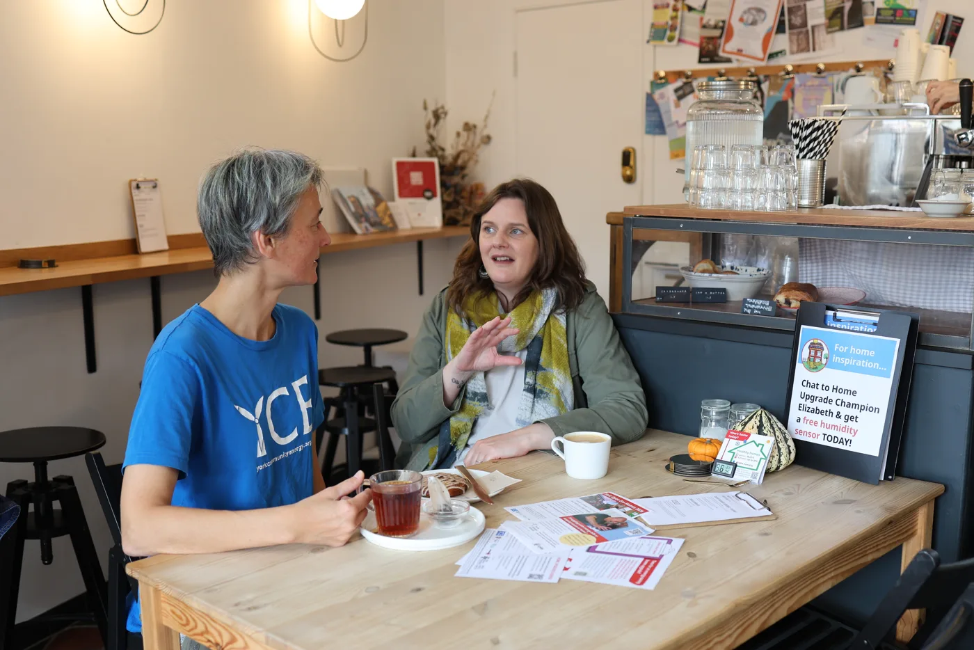 Ivana Jakubkova of York Community Energy and Home Upgrade Champion Elizabeth at Lapin café